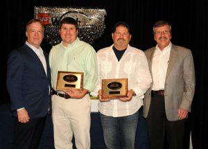 Members of Tri County Roofing getting awards.