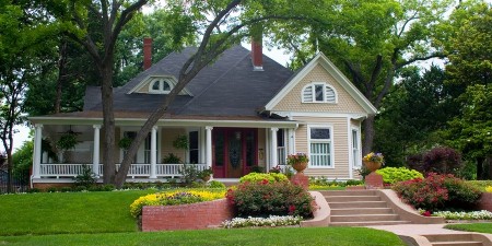 bigstockphoto_Classic_House_With_Flower_Gard_571873