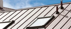 Metal roof with skylights installed